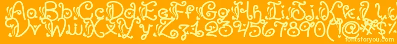 Sexyrexy Font – Yellow Fonts on Orange Background