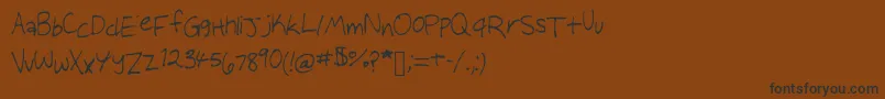 Audreysscribbles Font – Black Fonts on Brown Background