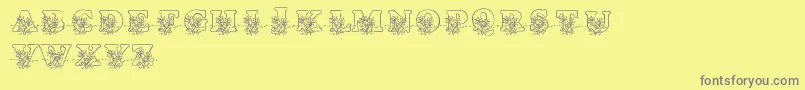 LmsLovesMe-fontti – harmaat kirjasimet keltaisella taustalla