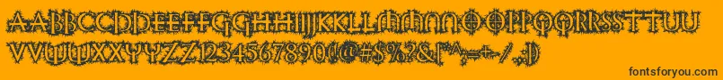 Witchinghour-Schriftart – Schwarze Schriften auf orangefarbenem Hintergrund