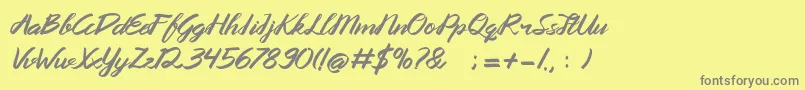 Queenata-Schriftart – Graue Schriften auf gelbem Hintergrund