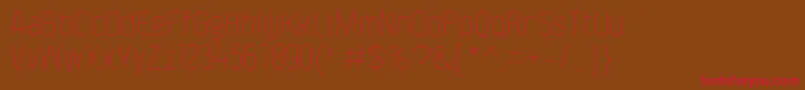 F4aagentcondthin Font – Red Fonts on Brown Background