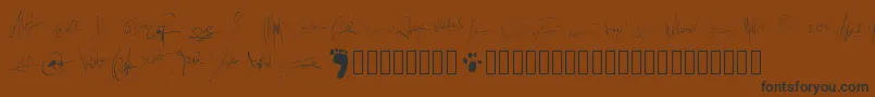 フォントPwsignatures – 黒い文字が茶色の背景にあります