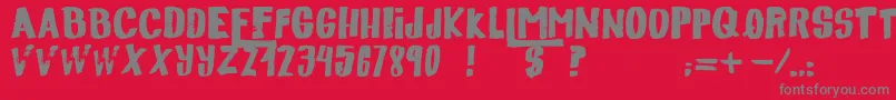 Descolorido-fontti – harmaat kirjasimet punaisella taustalla