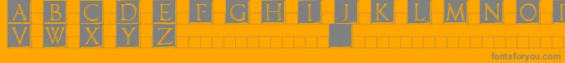 Imperatorplaque-Schriftart – Graue Schriften auf orangefarbenem Hintergrund