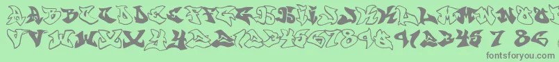 Graffonti.Atomic.Bomb-fontti – harmaat kirjasimet vihreällä taustalla