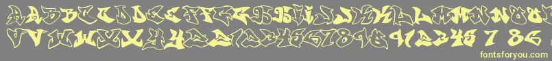 Graffonti.Atomic.Bomb Font – Yellow Fonts on Gray Background