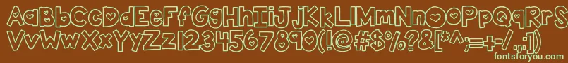 Kbtwolovers-fontti – vihreät fontit ruskealla taustalla