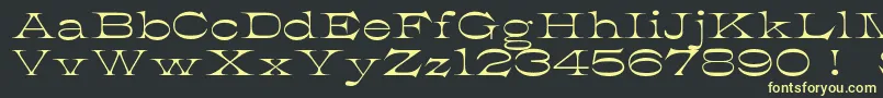 K22AthenianWide Font – Yellow Fonts on Black Background