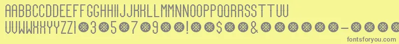 TeamCaptainDemo-fontti – harmaat kirjasimet keltaisella taustalla