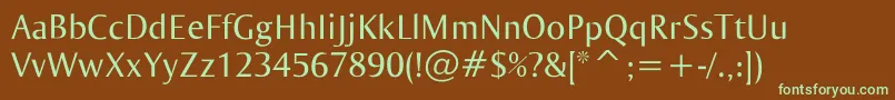 フォントOgirema – 緑色の文字が茶色の背景にあります。