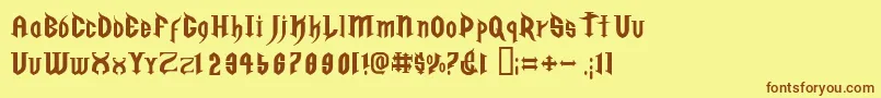 フォントGolgothaRegularE. – 茶色の文字が黄色の背景にあります。