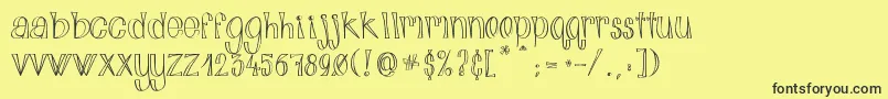 AlphabitsLight Font – Black Fonts on Yellow Background