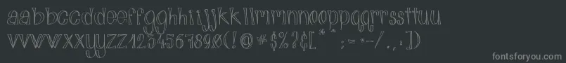 フォントAlphabitsLight – 黒い背景に灰色の文字