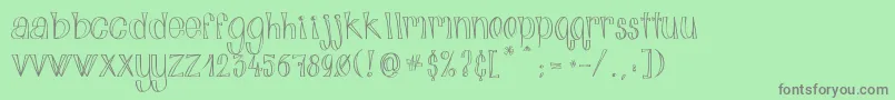 AlphabitsLight Font – Gray Fonts on Green Background