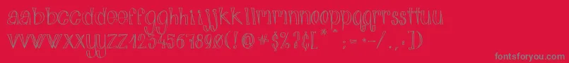 AlphabitsLight-Schriftart – Graue Schriften auf rotem Hintergrund