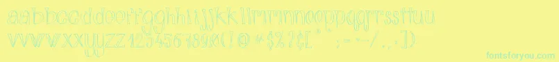 AlphabitsLight Font – Green Fonts on Yellow Background