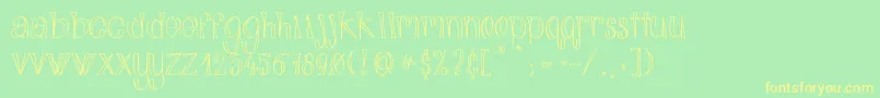 AlphabitsLight Font – Yellow Fonts on Green Background