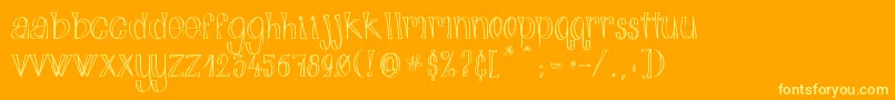 AlphabitsLight-Schriftart – Gelbe Schriften auf orangefarbenem Hintergrund