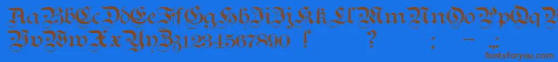 フォントTeutonic1 – 茶色の文字が青い背景にあります。