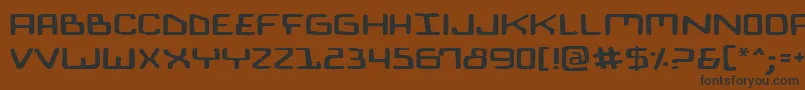 BionicComicExpanded-fontti – mustat fontit ruskealla taustalla