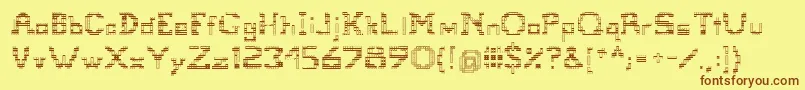 フォントTetris – 茶色の文字が黄色の背景にあります。