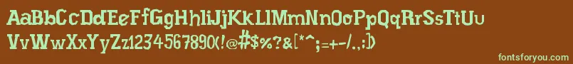 フォントXiloProsa – 緑色の文字が茶色の背景にあります。