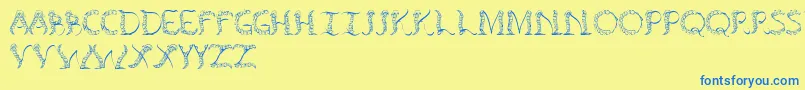 Tenchceliber Font – Blue Fonts on Yellow Background