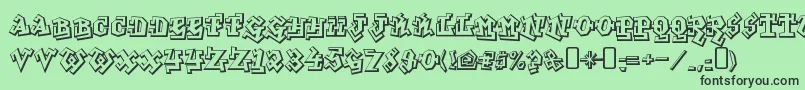 GraffititreatRegular Font – Black Fonts on Green Background