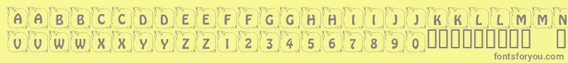 LcrPrissyPig-Schriftart – Graue Schriften auf gelbem Hintergrund