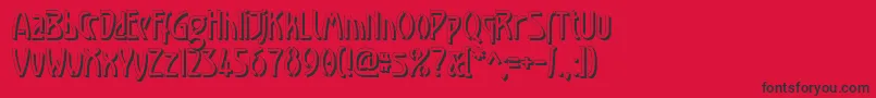 Luxembourg1910Shadow Font – Black Fonts on Red Background