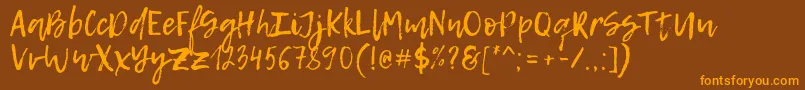 LemonTuesday Font – Orange Fonts on Brown Background