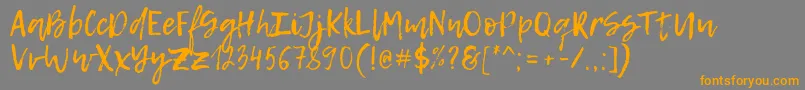 LemonTuesday Font – Orange Fonts on Gray Background