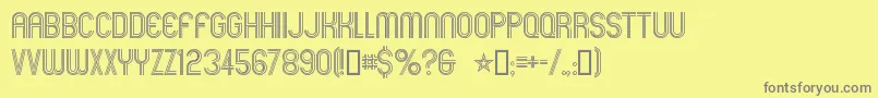 Mexcellent-fontti – harmaat kirjasimet keltaisella taustalla