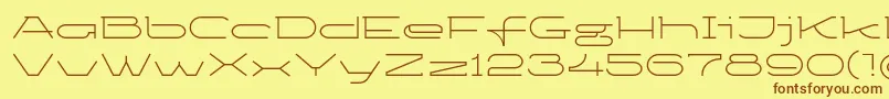 フォントKetosaglt – 茶色の文字が黄色の背景にあります。