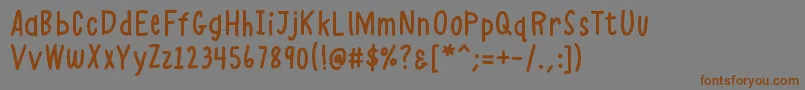 K26alphacasual-fontti – ruskeat fontit harmaalla taustalla