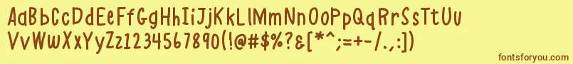 K26alphacasual Font – Brown Fonts on Yellow Background