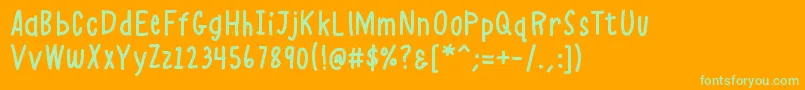 K26alphacasual-Schriftart – Grüne Schriften auf orangefarbenem Hintergrund