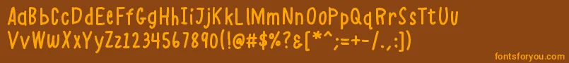 K26alphacasual Font – Orange Fonts on Brown Background