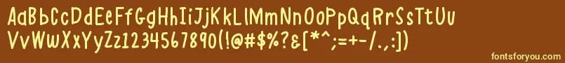 K26alphacasual-Schriftart – Gelbe Schriften auf braunem Hintergrund