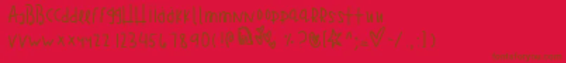 Tragickingdom Font – Brown Fonts on Red Background