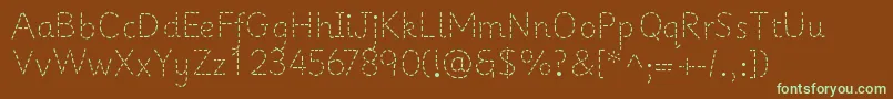 PrimerapplesRegular Font – Green Fonts on Brown Background