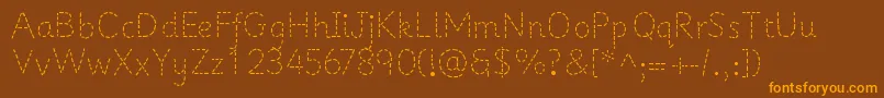 PrimerapplesRegular Font – Orange Fonts on Brown Background