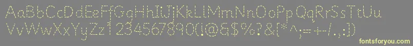 PrimerapplesRegular Font – Yellow Fonts on Gray Background