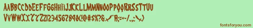 More about Eskindar Font Eskindar Font – Brown Fonts on Green Background