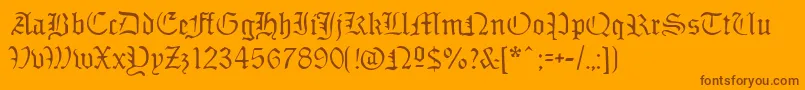 Sabbathblackregular-Schriftart – Braune Schriften auf orangefarbenem Hintergrund