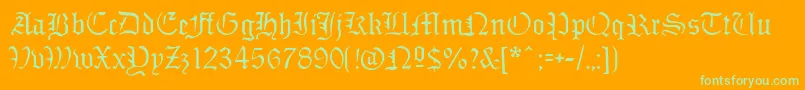 Sabbathblackregular-Schriftart – Grüne Schriften auf orangefarbenem Hintergrund