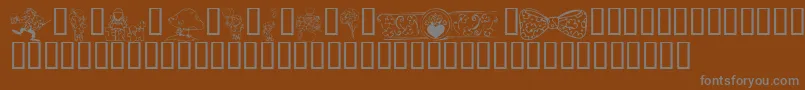 KrIrishKat2 Font – Gray Fonts on Brown Background
