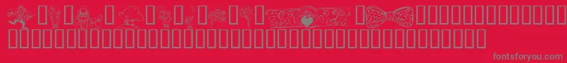 フォントKrIrishKat2 – 赤い背景に灰色の文字