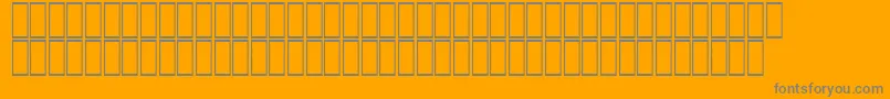 Czcionka AcsTopazzExtraBold – szare czcionki na pomarańczowym tle